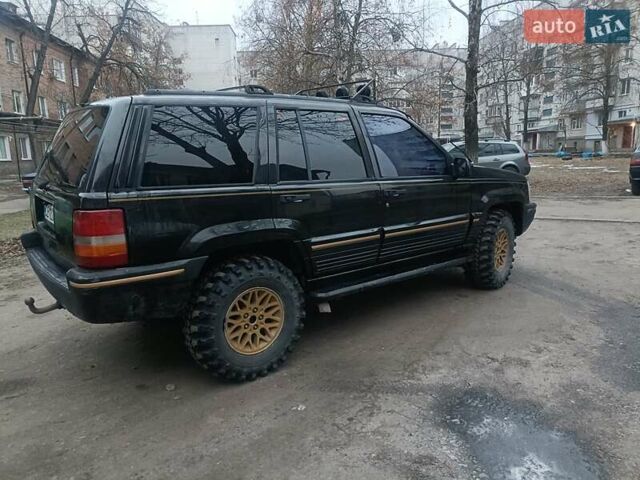 Черный Джип Гранд Чероки, объемом двигателя 5.2 л и пробегом 350 тыс. км за 5400 $, фото 1 на Automoto.ua