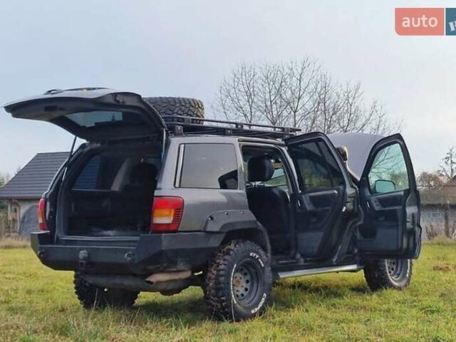 Чорний Джип Grand Cherokee, об'ємом двигуна 2.7 л та пробігом 275 тис. км за 3750 $, фото 12 на Automoto.ua