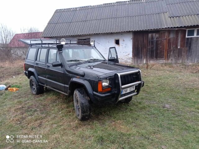 Чорний Джип Grand Cherokee, об'ємом двигуна 2.5 л та пробігом 100 тис. км за 3700 $, фото 3 на Automoto.ua