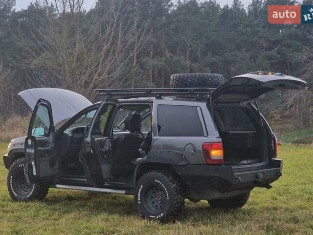 Чорний Джип Grand Cherokee, об'ємом двигуна 2.7 л та пробігом 275 тис. км за 3750 $, фото 11 на Automoto.ua