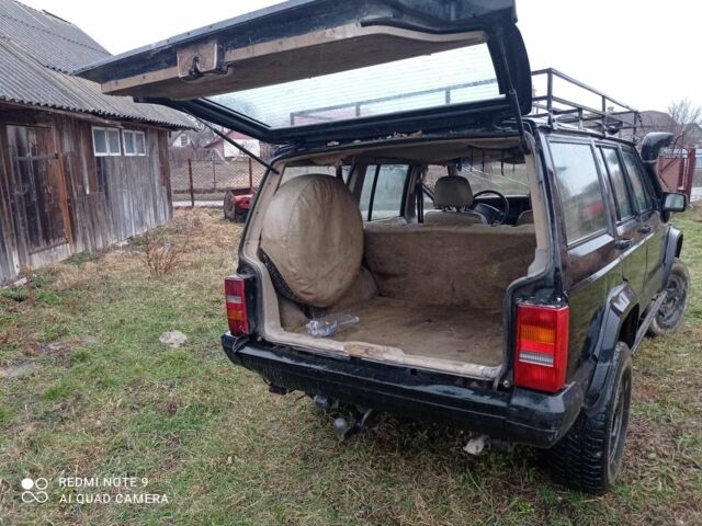 Чорний Джип Grand Cherokee, об'ємом двигуна 2.5 л та пробігом 100 тис. км за 3700 $, фото 2 на Automoto.ua