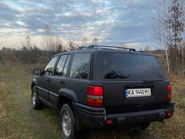 Черный Джип Гранд Чероки, объемом двигателя 4 л и пробегом 400 тыс. км за 2900 $, фото 3 на Automoto.ua