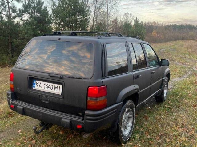 Черный Джип Гранд Чероки, объемом двигателя 4 л и пробегом 400 тыс. км за 2900 $, фото 4 на Automoto.ua