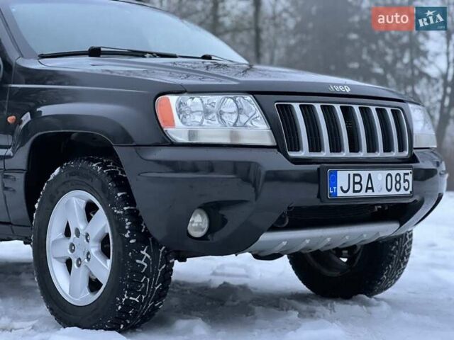 Черный Джип Гранд Чероки, объемом двигателя 2.69 л и пробегом 265 тыс. км за 4000 $, фото 1 на Automoto.ua