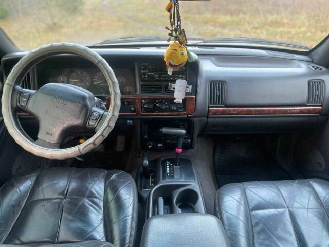 Черный Джип Гранд Чероки, объемом двигателя 4 л и пробегом 400 тыс. км за 2900 $, фото 6 на Automoto.ua