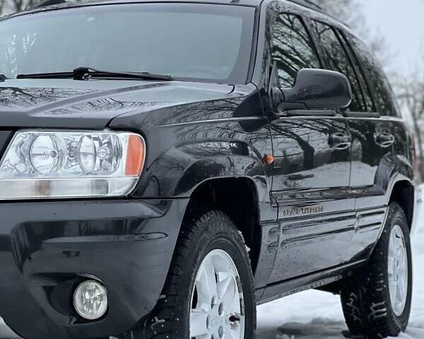 Черный Джип Гранд Чероки, объемом двигателя 2.69 л и пробегом 265 тыс. км за 4000 $, фото 4 на Automoto.ua