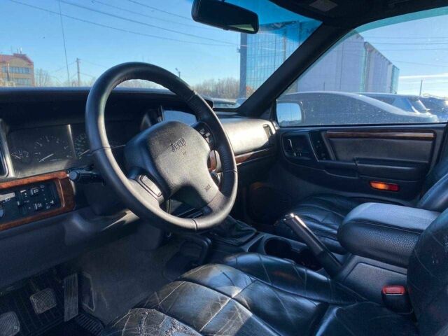 Чорний Джип Grand Cherokee, об'ємом двигуна 0.25 л та пробігом 428 тис. км за 7000 $, фото 7 на Automoto.ua