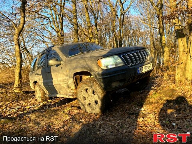 Чорний Джип Grand Cherokee, об'ємом двигуна 4.7 л та пробігом 200 тис. км за 7500 $, фото 6 на Automoto.ua