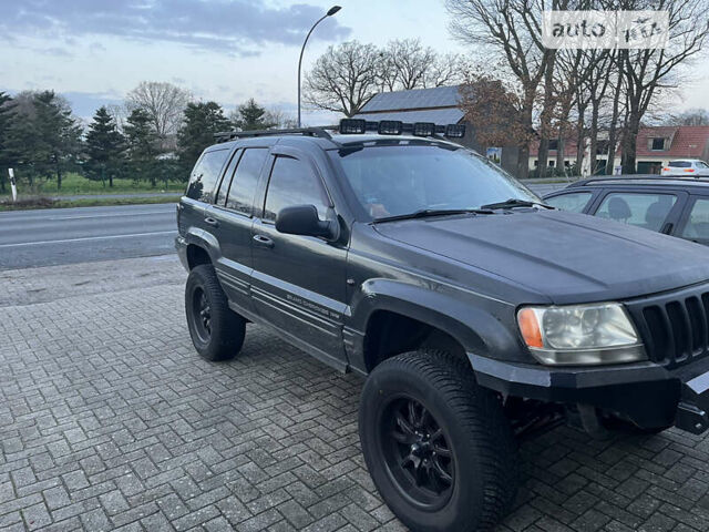 Чорний Джип Grand Cherokee, об'ємом двигуна 4.7 л та пробігом 350 тис. км за 6000 $, фото 2 на Automoto.ua