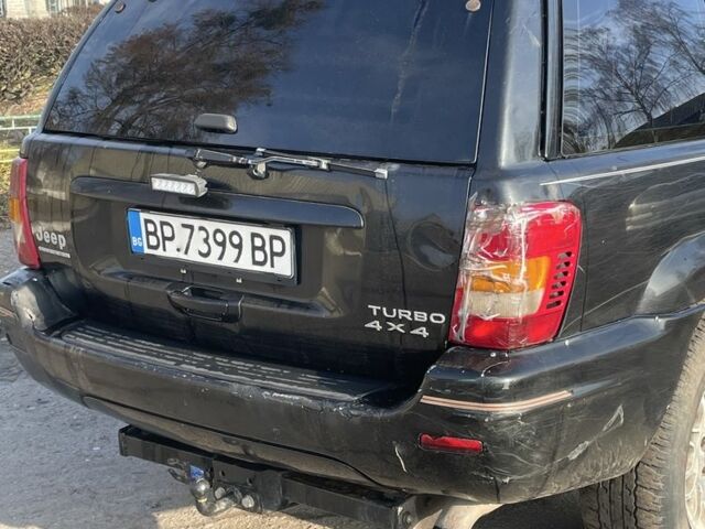 Черный Джип Гранд Чероки, объемом двигателя 3.1 л и пробегом 280 тыс. км за 3000 $, фото 4 на Automoto.ua
