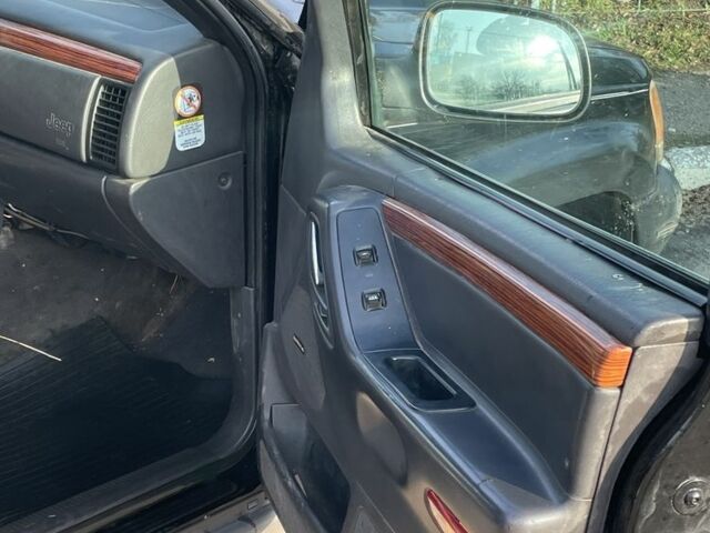 Черный Джип Гранд Чероки, объемом двигателя 3.1 л и пробегом 280 тыс. км за 3000 $, фото 7 на Automoto.ua