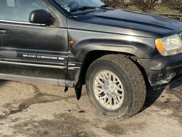 Черный Джип Гранд Чероки, объемом двигателя 3.1 л и пробегом 280 тыс. км за 3000 $, фото 2 на Automoto.ua