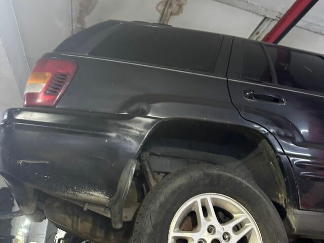 Чорний Джип Grand Cherokee, об'ємом двигуна 0 л та пробігом 300 тис. км за 3900 $, фото 3 на Automoto.ua