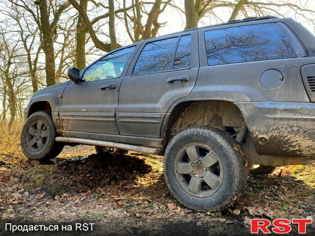 Чорний Джип Grand Cherokee, об'ємом двигуна 4.7 л та пробігом 200 тис. км за 7500 $, фото 2 на Automoto.ua