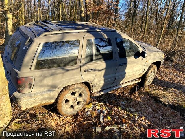 Чорний Джип Grand Cherokee, об'ємом двигуна 4.7 л та пробігом 200 тис. км за 7500 $, фото 5 на Automoto.ua