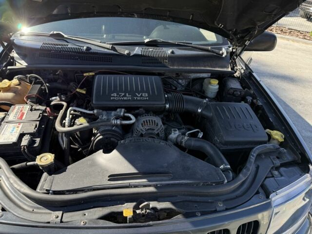 Черный Джип Гранд Чероки, объемом двигателя 4.7 л и пробегом 350 тыс. км за 11000 $, фото 12 на Automoto.ua