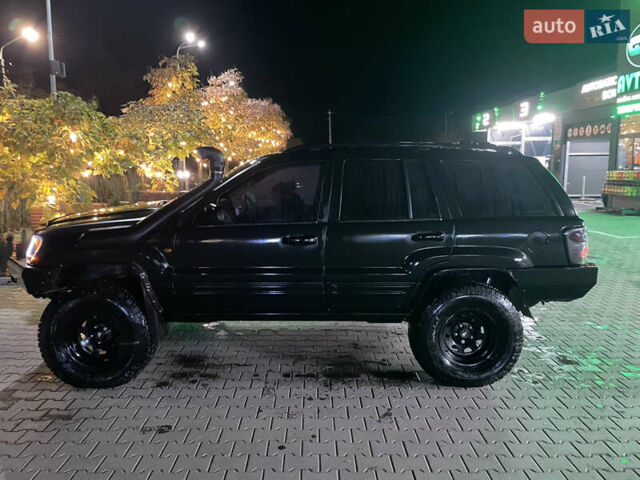 Джип Гранд Чероки 2000 в Черновцах на Automoto.ua Черный Джип Гранд Чероки, объемом двигателя 4.7 л и пробегом 350 тыс. км за 14000 $, фото 5 на Automoto.ua