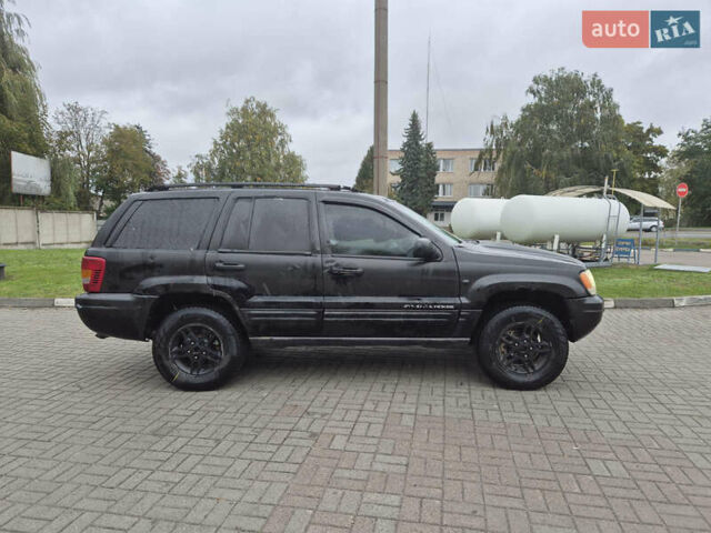 Черный Джип Гранд Чероки, объемом двигателя 3.12 л и пробегом 390 тыс. км за 3999 $, фото 3 на Automoto.ua