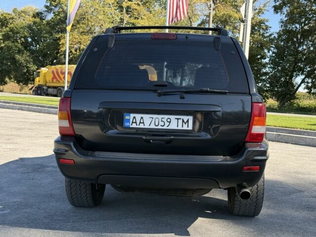 Черный Джип Гранд Чероки, объемом двигателя 4.7 л и пробегом 350 тыс. км за 11000 $, фото 6 на Automoto.ua