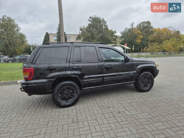 Черный Джип Гранд Чероки, объемом двигателя 3.12 л и пробегом 390 тыс. км за 3999 $, фото 7 на Automoto.ua