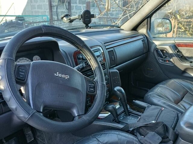 Черный Джип Гранд Чероки, объемом двигателя 3.1 л и пробегом 280 тыс. км за 5500 $, фото 8 на Automoto.ua