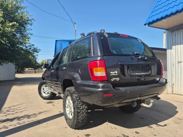 Черный Джип Гранд Чероки, объемом двигателя 3.1 л и пробегом 279 тыс. км за 6850 $, фото 5 на Automoto.ua