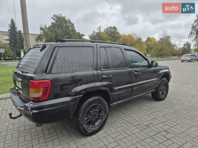 Черный Джип Гранд Чероки, объемом двигателя 3.12 л и пробегом 390 тыс. км за 3999 $, фото 6 на Automoto.ua