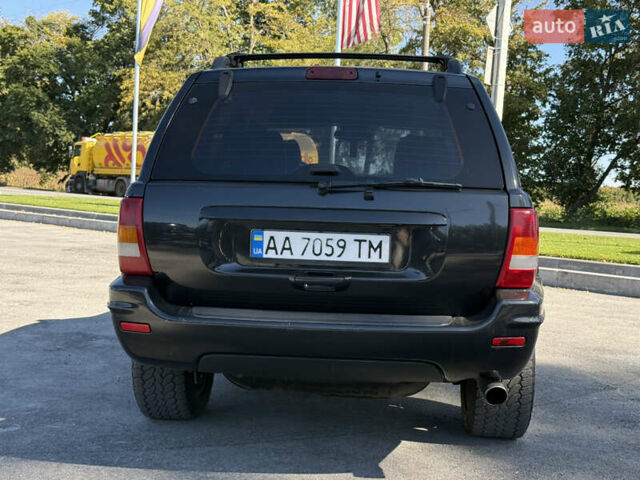 Черный Джип Гранд Чероки, объемом двигателя 4.7 л и пробегом 349 тыс. км за 12000 $, фото 6 на Automoto.ua