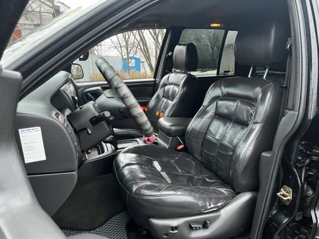 Черный Джип Гранд Чероки, объемом двигателя 3.1 л и пробегом 430 тыс. км за 3500 $, фото 6 на Automoto.ua