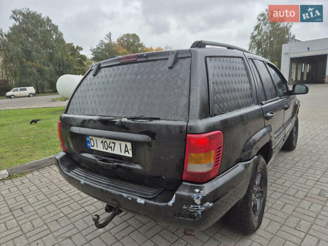 Черный Джип Гранд Чероки, объемом двигателя 3.12 л и пробегом 390 тыс. км за 3999 $, фото 10 на Automoto.ua