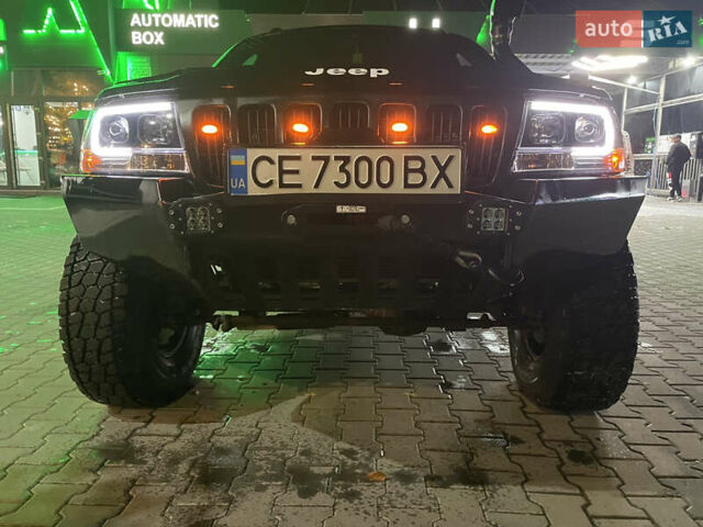 Джип Гранд Чероки 2000 в Черновцах на Automoto.ua Черный Джип Гранд Чероки, объемом двигателя 4.7 л и пробегом 350 тыс. км за 14000 $, фото 1 на Automoto.ua