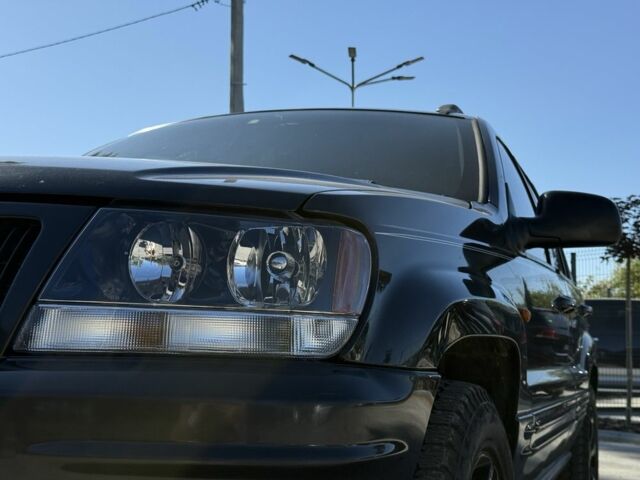 Черный Джип Гранд Чероки, объемом двигателя 4.7 л и пробегом 350 тыс. км за 11000 $, фото 10 на Automoto.ua