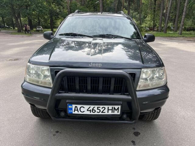 Черный Джип Гранд Чероки, объемом двигателя 3.1 л и пробегом 253 тыс. км за 4700 $, фото 2 на Automoto.ua