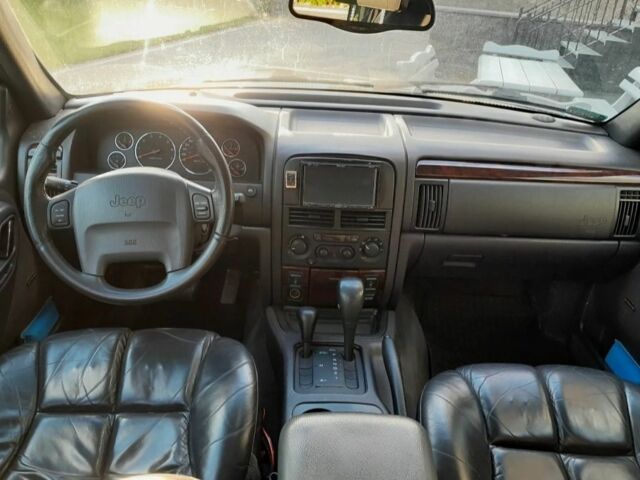 Черный Джип Гранд Чероки, объемом двигателя 2.7 л и пробегом 257 тыс. км за 3200 $, фото 5 на Automoto.ua