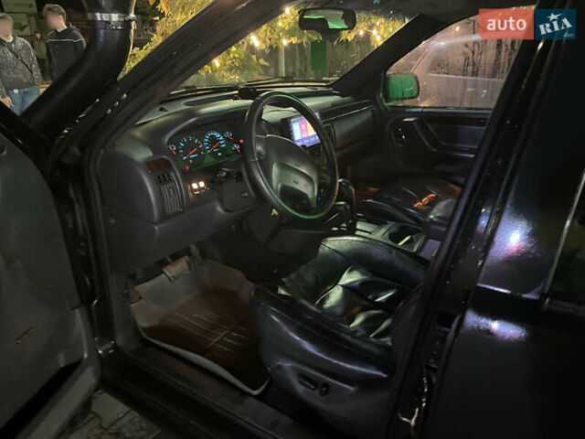 Джип Гранд Чероки 2000 в Черновцах на Automoto.ua Черный Джип Гранд Чероки, объемом двигателя 4.7 л и пробегом 350 тыс. км за 14000 $, фото 16 на Automoto.ua