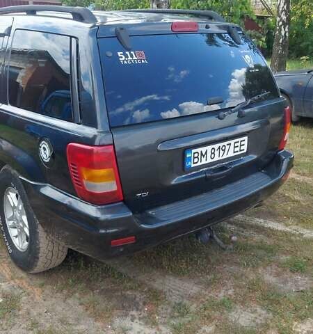 Чорний Джип Grand Cherokee, об'ємом двигуна 3.12 л та пробігом 270 тис. км за 6700 $, фото 2 на Automoto.ua
