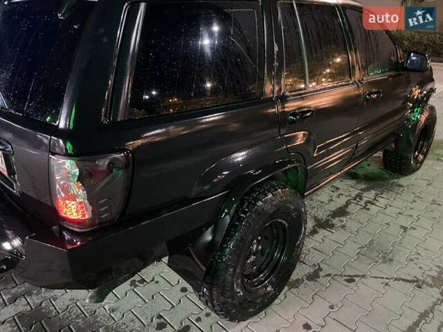 Джип Гранд Чероки 2000 в Черновцах на Automoto.ua Черный Джип Гранд Чероки, объемом двигателя 4.7 л и пробегом 350 тыс. км за 14000 $, фото 9 на Automoto.ua