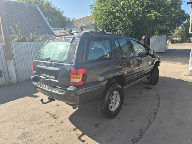 Черный Джип Гранд Чероки, объемом двигателя 3.1 л и пробегом 279 тыс. км за 6850 $, фото 4 на Automoto.ua