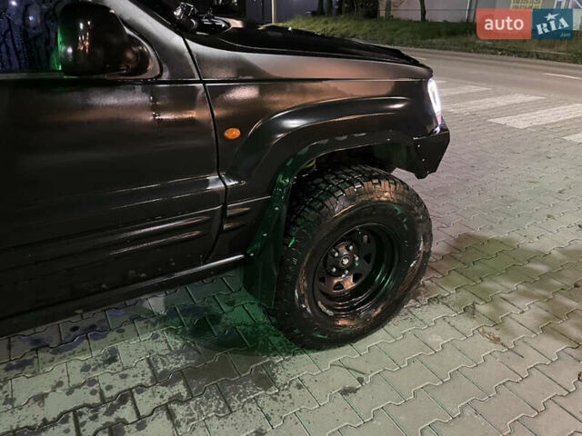 Джип Гранд Чероки 2000 в Черновцах на Automoto.ua Черный Джип Гранд Чероки, объемом двигателя 4.7 л и пробегом 350 тыс. км за 14000 $, фото 11 на Automoto.ua