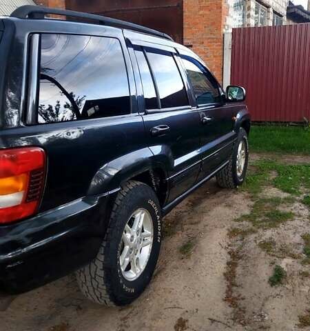 Чорний Джип Grand Cherokee, об'ємом двигуна 3.12 л та пробігом 270 тис. км за 6700 $, фото 4 на Automoto.ua