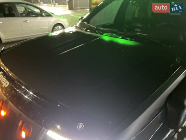 Джип Гранд Чероки 2000 в Черновцах на Automoto.ua Черный Джип Гранд Чероки, объемом двигателя 4.7 л и пробегом 350 тыс. км за 14000 $, фото 2 на Automoto.ua