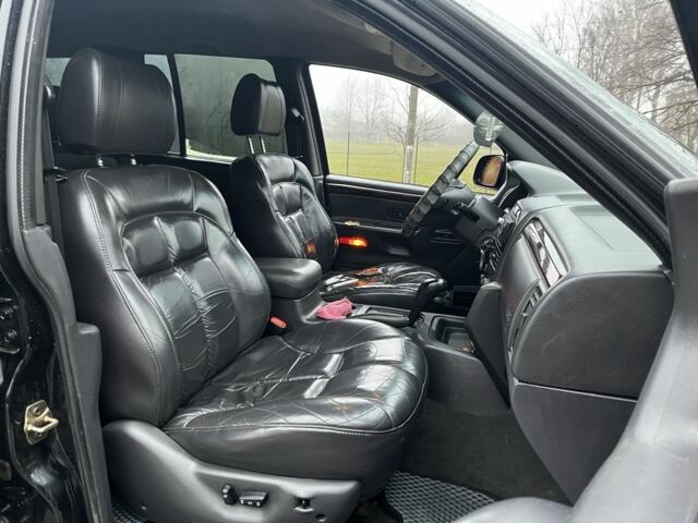 Черный Джип Гранд Чероки, объемом двигателя 3.1 л и пробегом 430 тыс. км за 3500 $, фото 8 на Automoto.ua