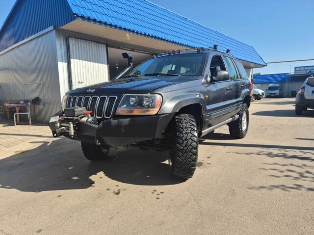 Черный Джип Гранд Чероки, объемом двигателя 3.1 л и пробегом 279 тыс. км за 6850 $, фото 2 на Automoto.ua