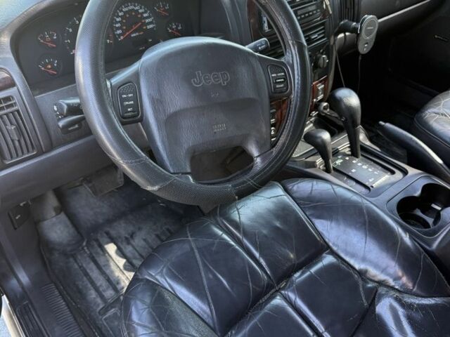 Черный Джип Гранд Чероки, объемом двигателя 4.7 л и пробегом 350 тыс. км за 11000 $, фото 14 на Automoto.ua