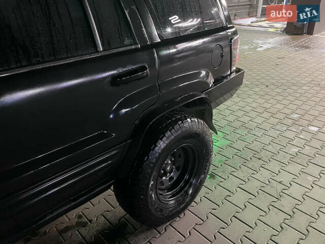 Джип Гранд Чероки 2000 в Черновцах на Automoto.ua Черный Джип Гранд Чероки, объемом двигателя 4.7 л и пробегом 350 тыс. км за 14000 $, фото 6 на Automoto.ua