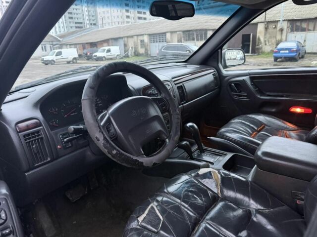 Черный Джип Гранд Чероки, объемом двигателя 2.5 л и пробегом 266 тыс. км за 3700 $, фото 6 на Automoto.ua