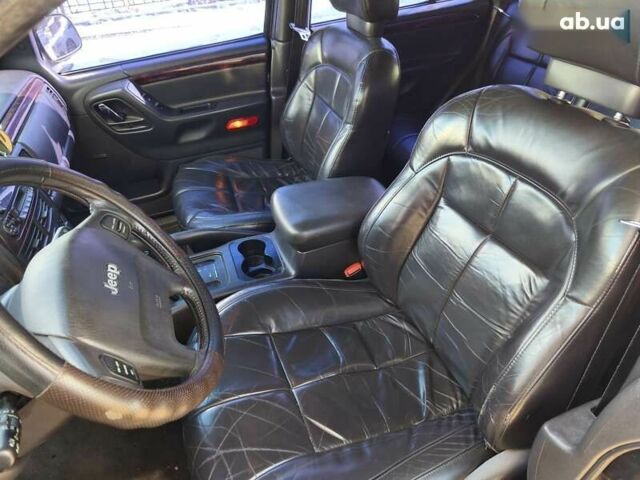 Чорний Джип Grand Cherokee, об'ємом двигуна 4.7 л та пробігом 350 тис. км за 6999 $, фото 12 на Automoto.ua