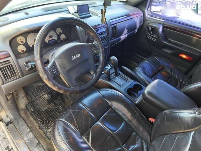 Чорний Джип Grand Cherokee, об'ємом двигуна 4.7 л та пробігом 350 тис. км за 6999 $, фото 11 на Automoto.ua