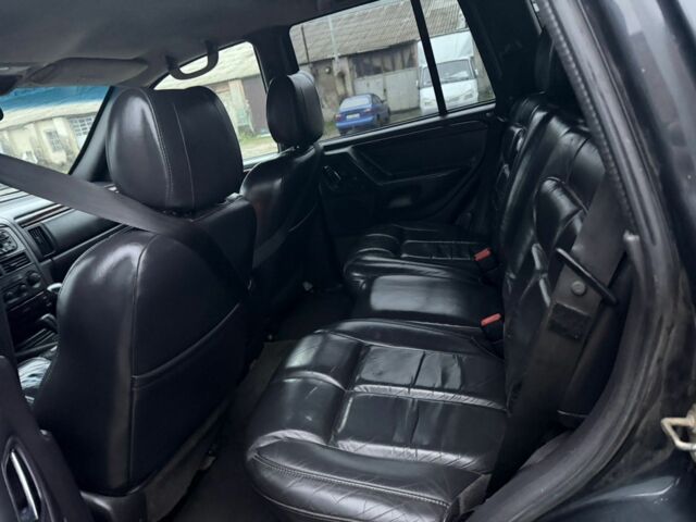 Черный Джип Гранд Чероки, объемом двигателя 2.7 л и пробегом 266 тыс. км за 3700 $, фото 7 на Automoto.ua