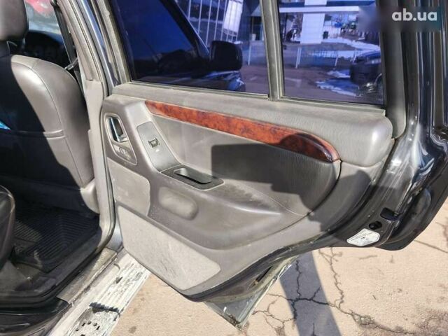 Чорний Джип Grand Cherokee, об'ємом двигуна 4.7 л та пробігом 350 тис. км за 6999 $, фото 16 на Automoto.ua